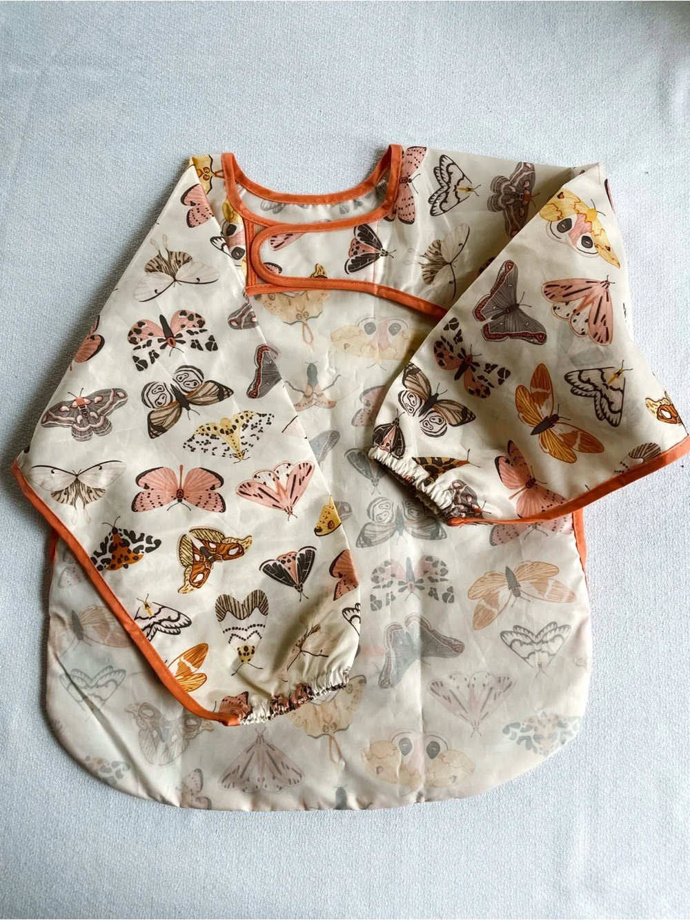 TINY TWINKLE Tiny Twinkle Mess Long Sleeve Bib Apron Art Food Butterfly Moth